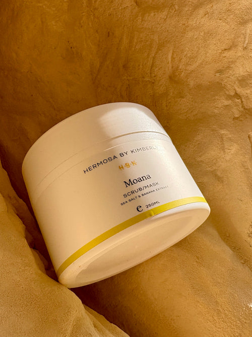 White jar with a label on a textured beige background